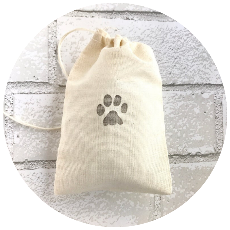 Paw Print Favor Bags by SweetThymes | 23+ Ways to include your dog in your wedding - These dog wedding ideas are perfect for the couple who wants to include their favorite pup on their big day!