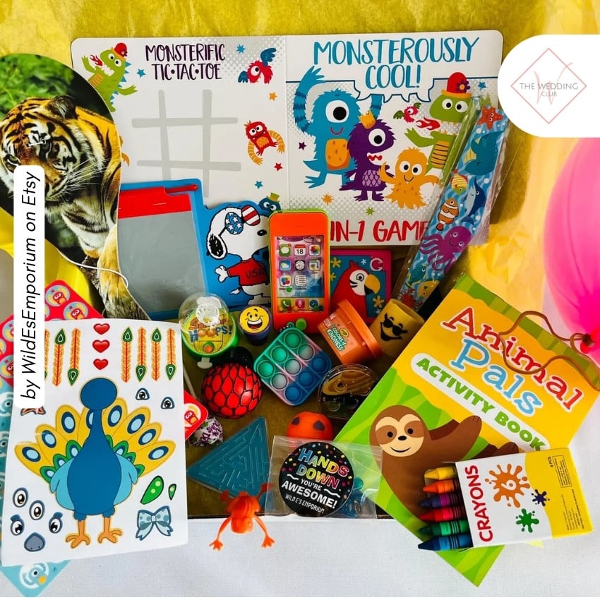 1 - Interactive Kids Busy Box by WildEsEmporium on Etsy - 43 Things to add to the kiddies table at your wedding - The Wedding Club