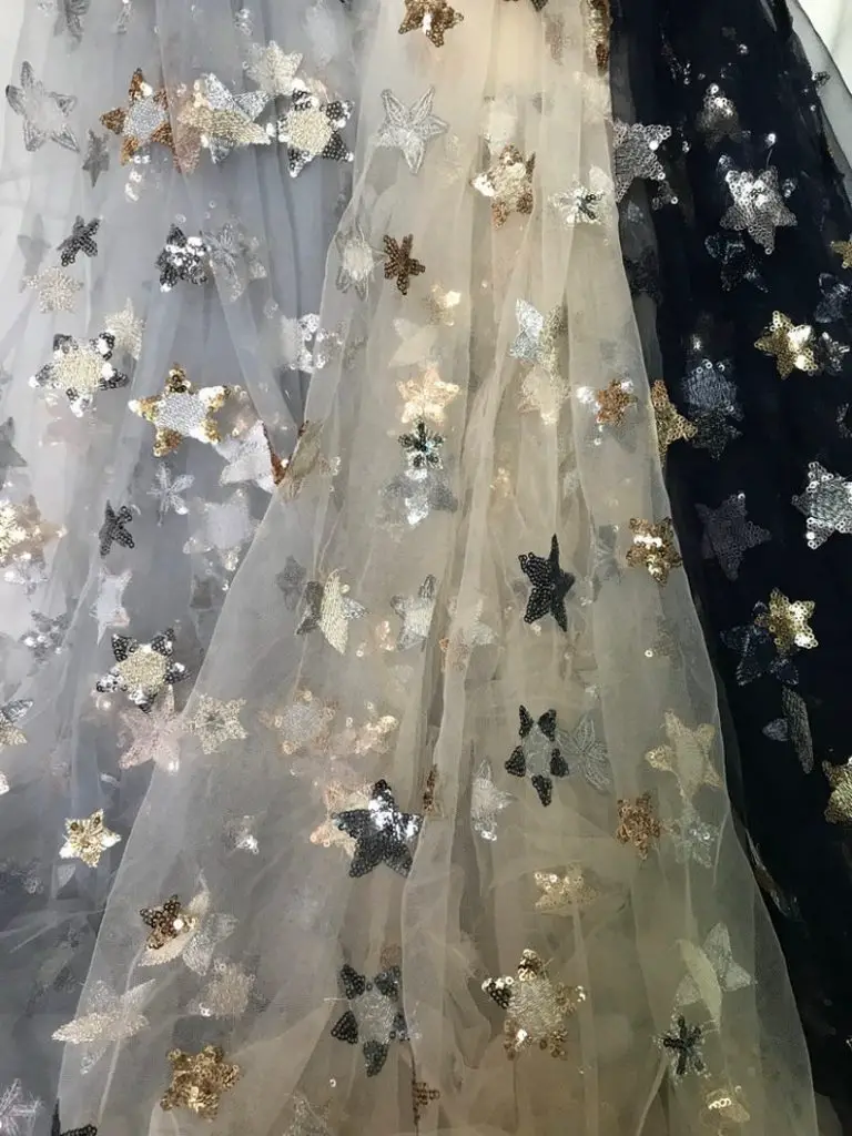 Beautiful stars lace fabric by lacelindsay on Etsy - Sparkly celestial wedding theme ideas - The Wedding Club
