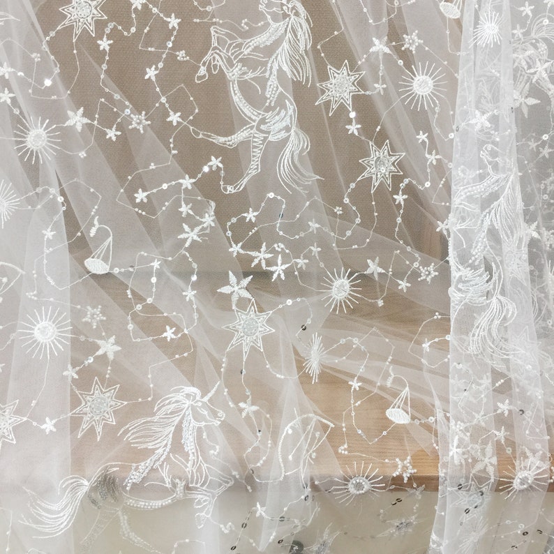 Star celestial Embroidery Fabric by makefordesign on Etsy - Sparkly celestial wedding theme ideas - The Wedding Club