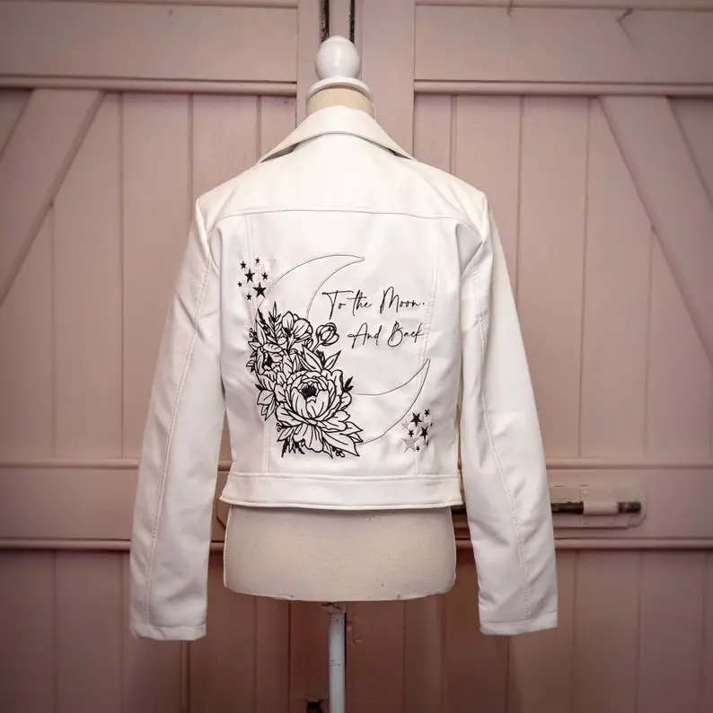 To the Moon and Back Leather Jacket by NiamhDesigns on Etsy - Sparkly celestial wedding theme ideas - The Wedding Club