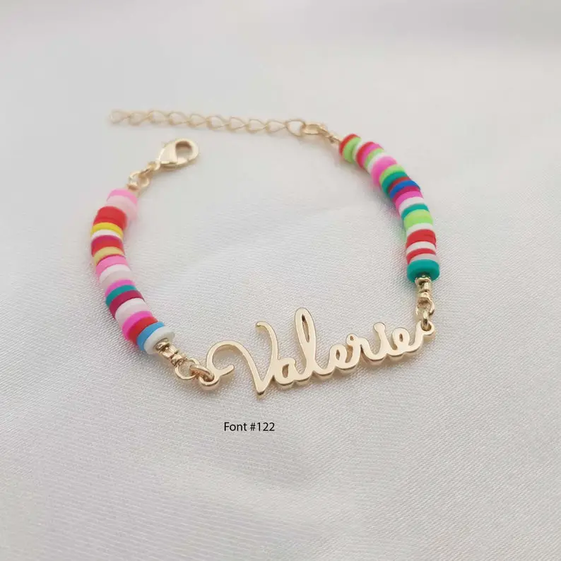 Girls Name Bracelet by VictoriaMinimalist on Etsy - Things to add to the kiddies table at your wedding - The Wedding Club