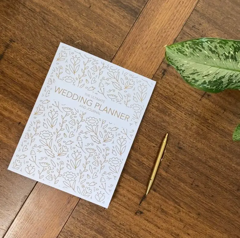 The Ultimate Wedding Planner & Journal by WaterGumPressStore on Etsy - 16 Fantastic Wedding Planners - The Wedding Club