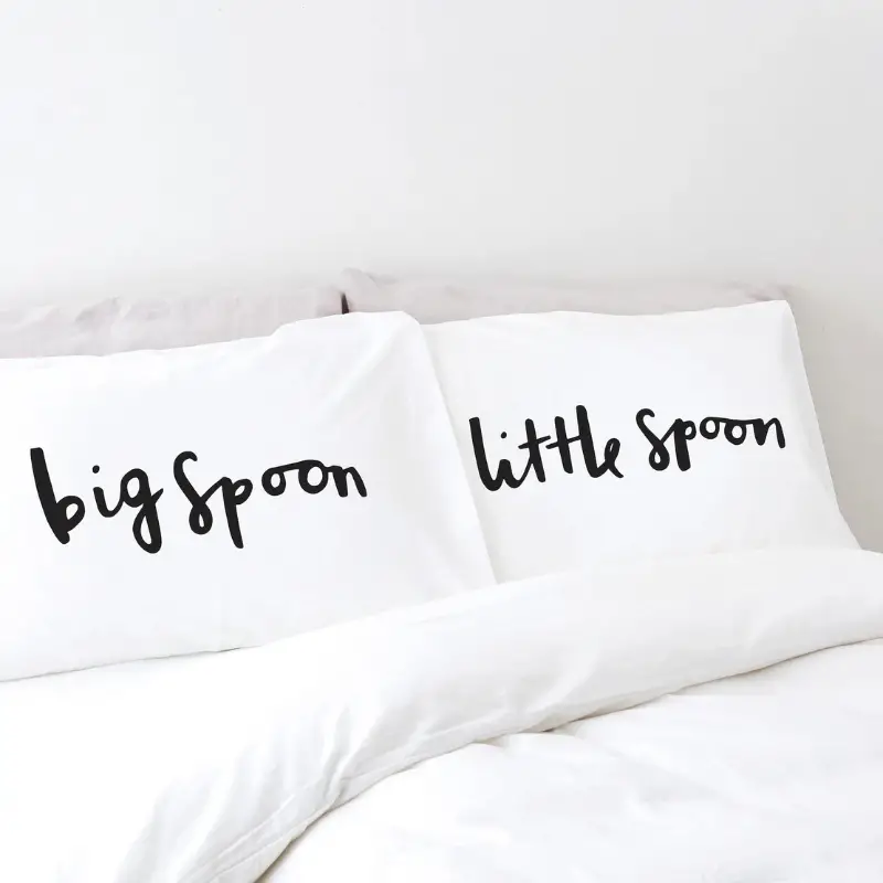 19. Spooning Pillow case set by OldEnglishCo on Etsy - 27 Unique Engagement Gifts for the Couple - The Wedding Club