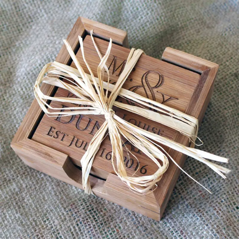 41. Personalized Bamboo Coasters by YouCanMAKEitPERSONAL on Etsy - 75 Best wedding gifts for couples - The Wedding Club