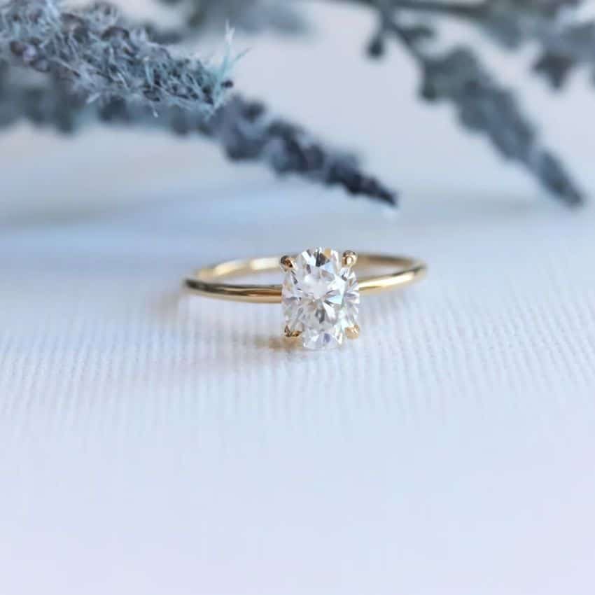 1.5ct Oval Moissanite Ring by DivyaGems on Etsy - 23 Best Quality Moissanite Engagement Rings on Etsy - The Wedding Club