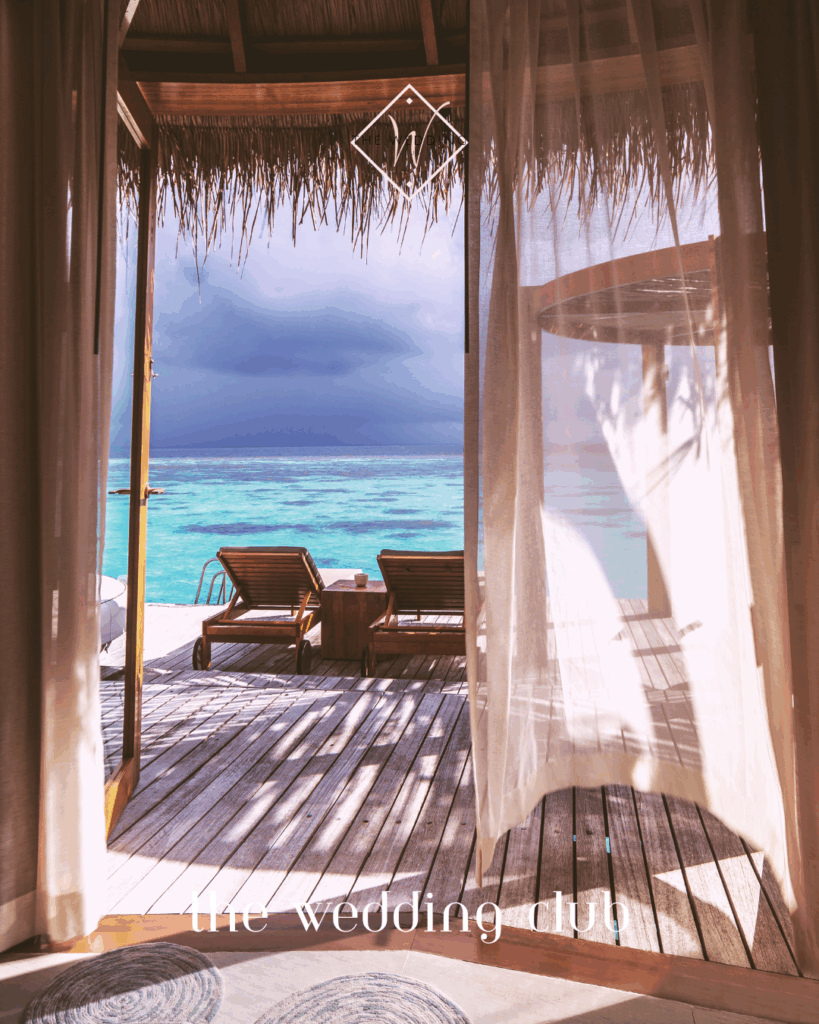 Oceanfront view from romantic overwater bungalow – perfect for a relaxing and scenic mini-moon getaway.