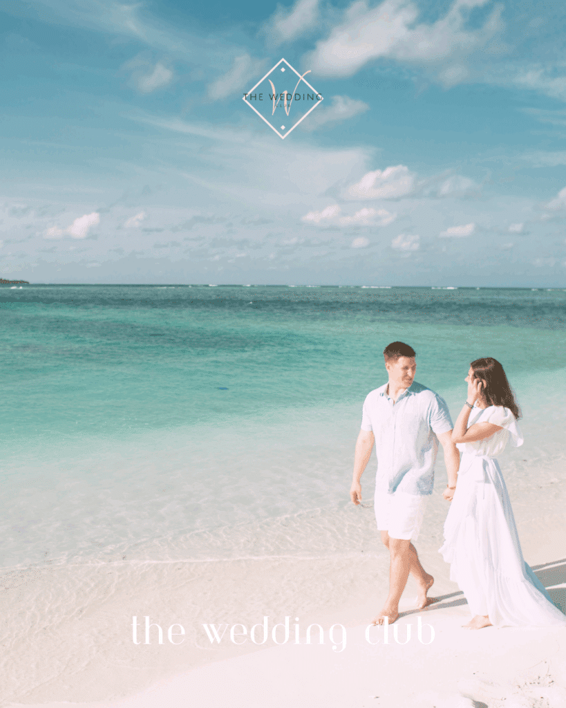Newlyweds walking hand in hand on a quiet tropical beach – romantic and simple mini-moon experience perfect for budget-conscious couples.