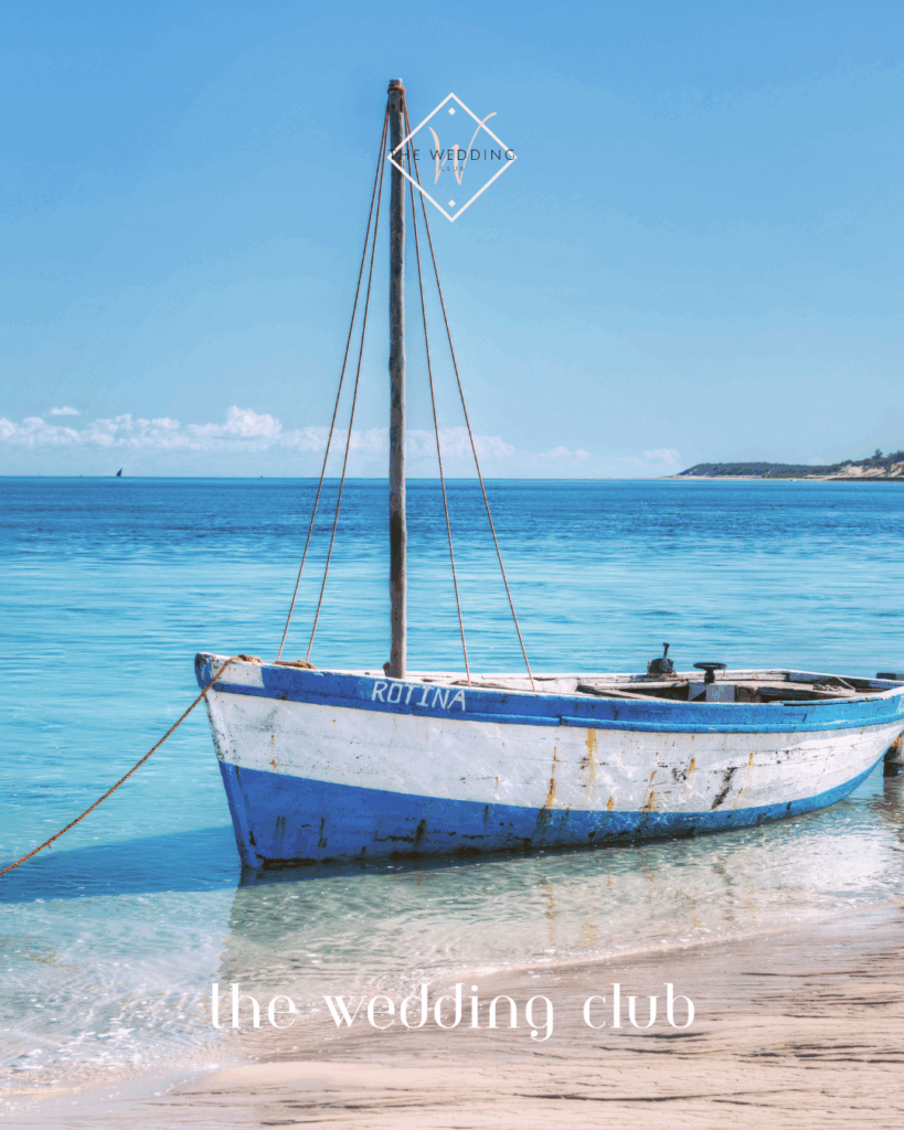 Traditional fishing boat on the shore in Mozambique – a peaceful and budget-friendly mini honeymoon destination.